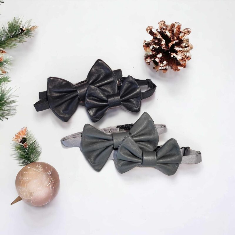 Acest set excepțional de accesorii constă în două papioane - unul pentru tată și unul pentru fiu - perfect pentru a aduce o notă de eleganță și veselie în timpul sărbătorilor de iarnă.
